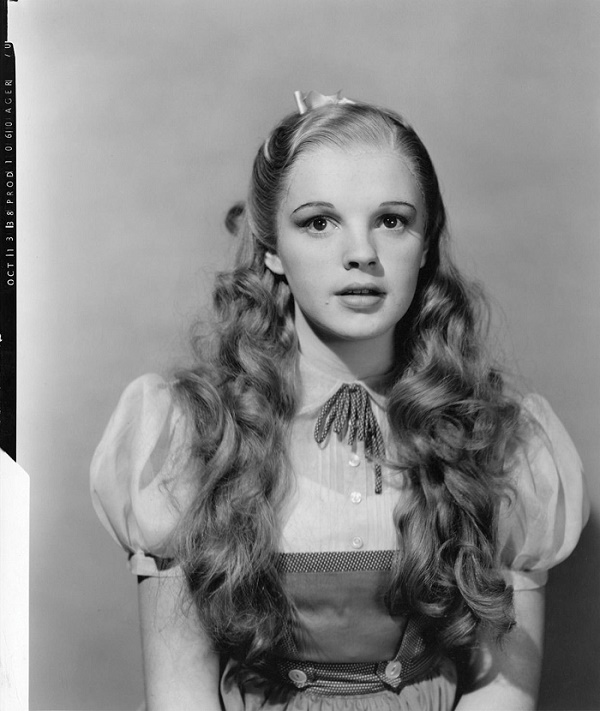 Garland originally wore glamorous make-up in the role, before producers decided to give her a more natural appearance 