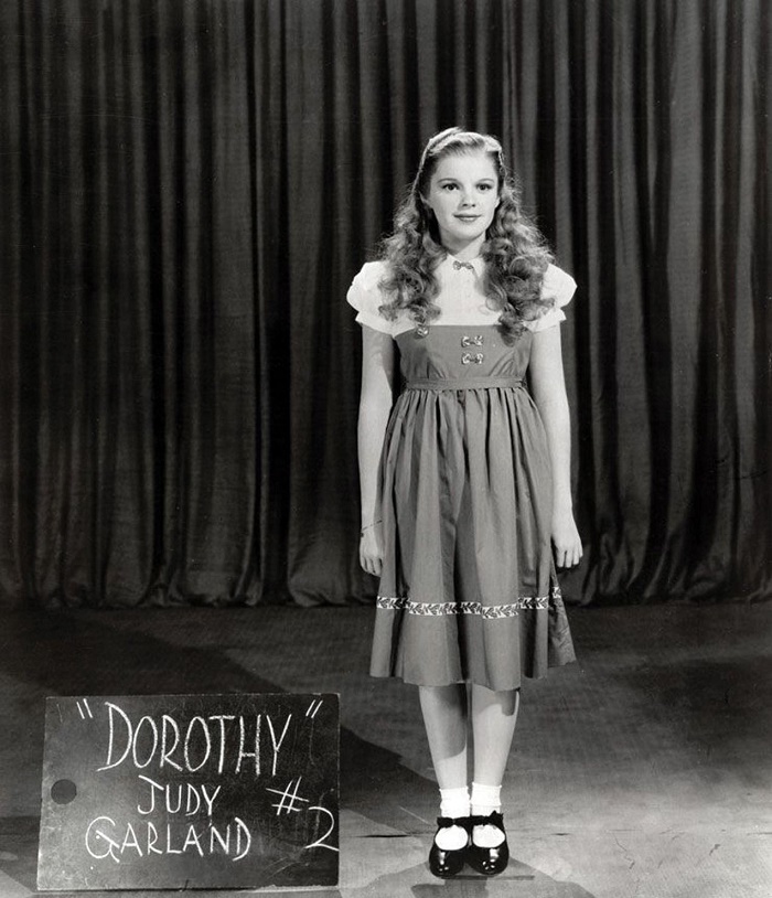 An early Judy Garland costume test, before she was given Dorothy's now-iconic blue and white gingham dress