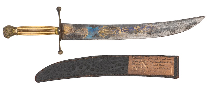 Crockett's knife, complete with its original scabbard and the period museum label 