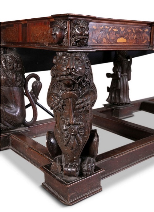 The table featured carvings of heraldic lions which were originally part of the ornamental woodwork of a Spanish galleon