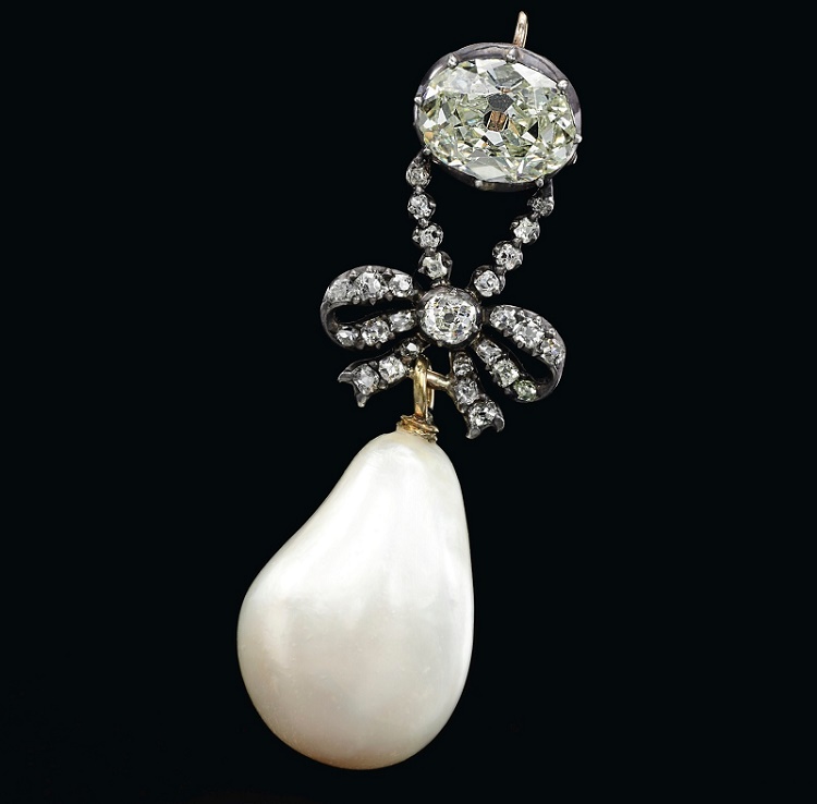 The pearl and diamond pendant sold for $36 million, more than trebling the previous auction record for a pearl jewel 