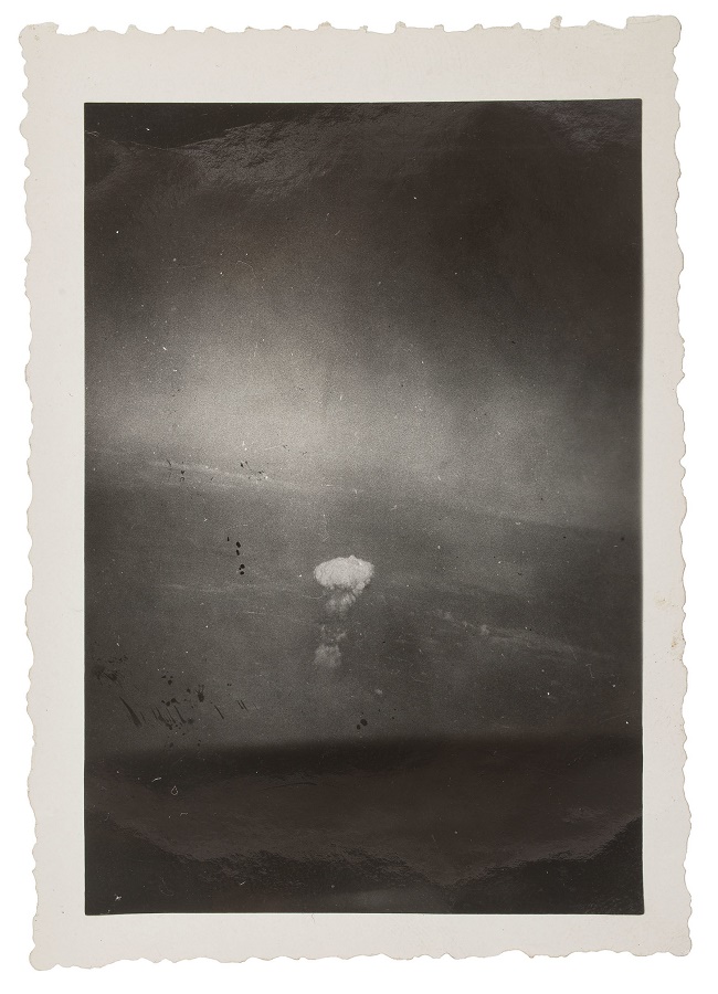  Gackenbach captured the mushroom cloud rising above the devastated city below 