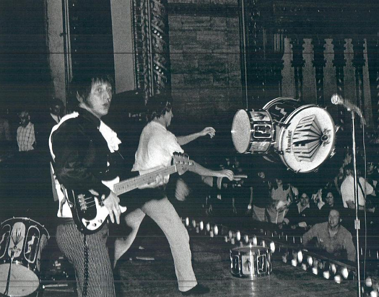 Keith Moon carefully packs up his drum kit after their show in Cleveland, Ohio in August 1967 