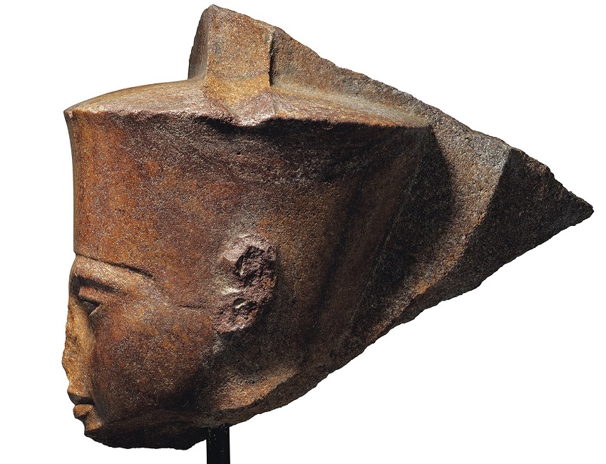 The sculpture is of the Ancient Egyptian God Amen, depicted with the features of the young Pharaoh Tutankhamen, circa 1333-1323 BC