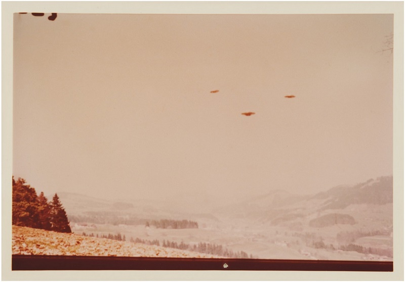 Billy Meier claims his photographs depict Plejaren 'beam ships' captured in the skies above rural Switzerland (Image: Sotheby's)