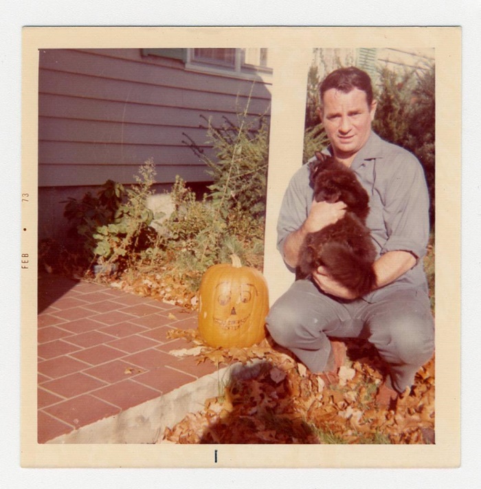 A Polaroid photograph of Jack Kerouac and his cat, taken from his personal photo scrapbook (Image: University Archives)