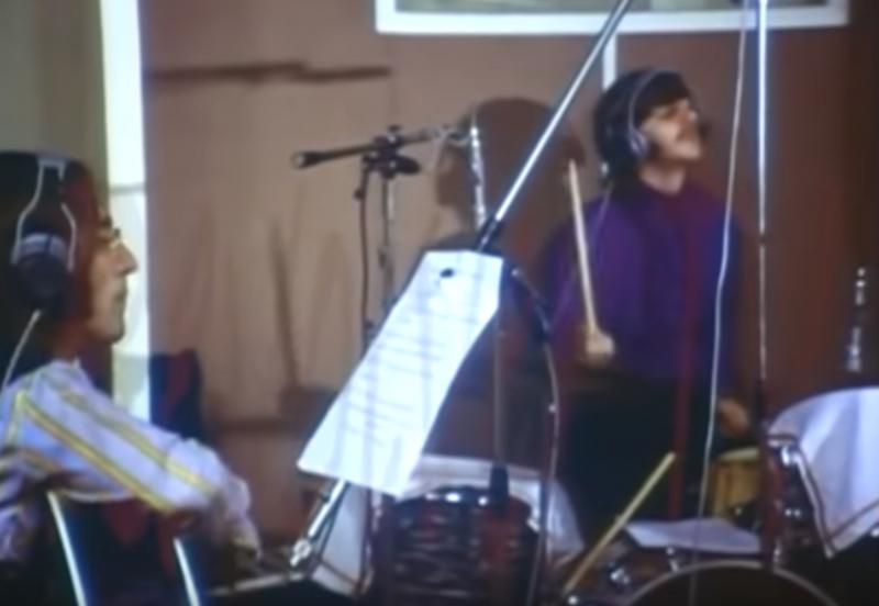 John Lennon is seen using the lyric sheet in a documentary filmed by the National Music Council of Great Britain during recording sessions (Image: Julien's Auctions)