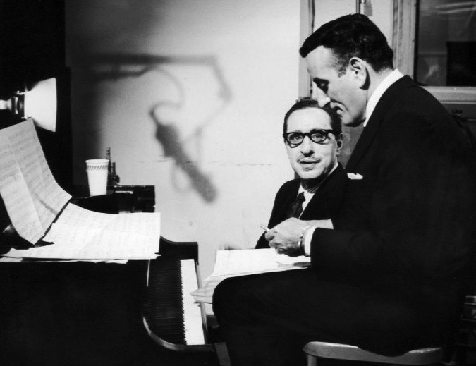 Tony Bennett working at a piano with composer Harold Arlen.