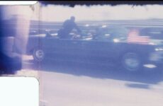 still image from footage of the John F Kennedy motorcade on the day of his assassination