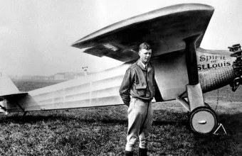 Charles Lindbergh in front of the Spirit of St Louis.