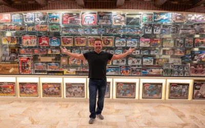 Jeff Jacobs with his action figure collection