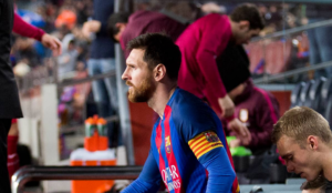 Lionel Messi ascends to the pitch at Barcelona Camp Nou stadium.