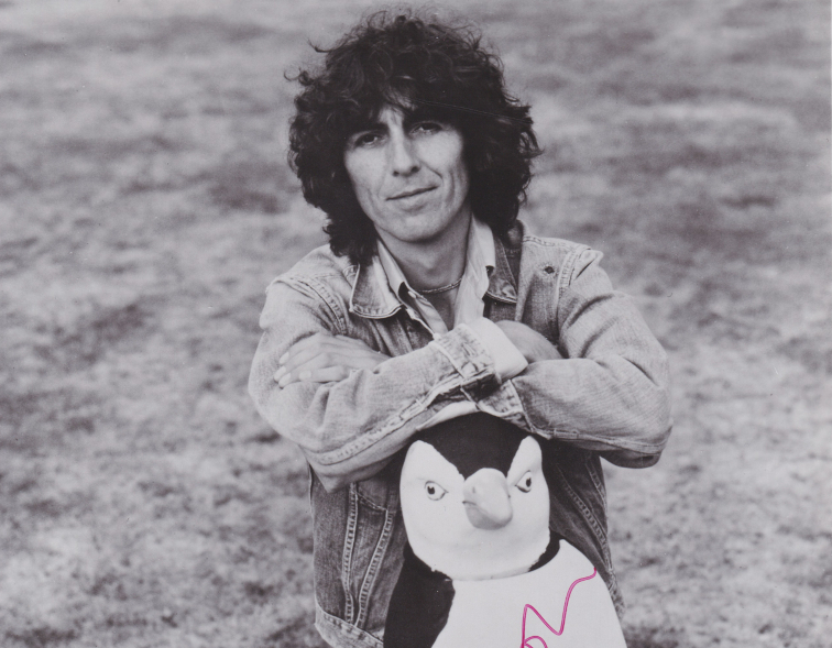 George Harrison signed photo with penguin ornament