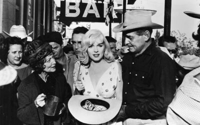 Marilyn Monroe with Clark Gable and other cast members of The Misfits.