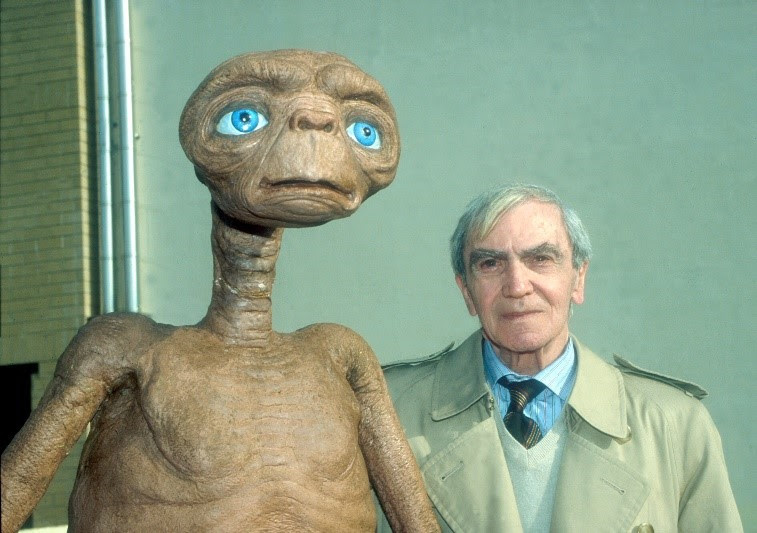 Carlos Rambaldi with his model of E.T. from the movie E.T. the Extra-Terrestrial. 