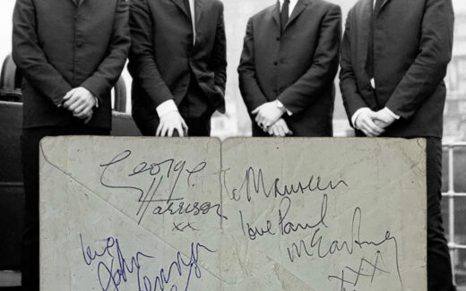 Beatles autographs on envelope.