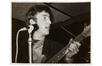 John Lennon performing with the Beatles in the Casbah Club, Hamburg in 1961.