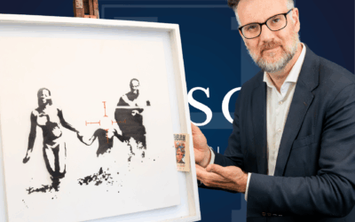 Charles Hanson of Hansons Auctioneers with Family Target by Banksy.