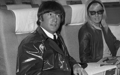 John and Cynthia Lennon on board a US plane in 1964
