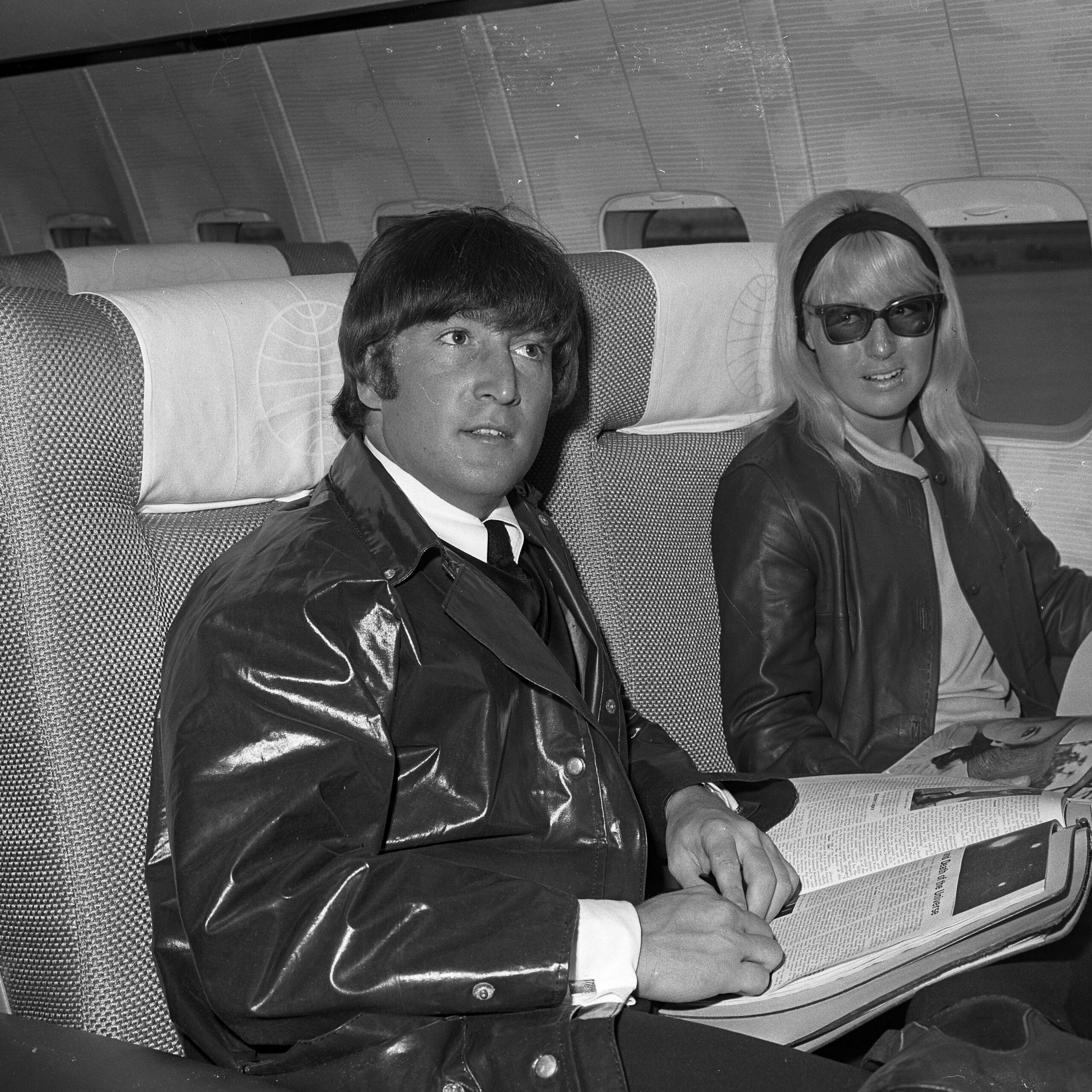 John and Cynthia Lennon on board a US plane in 1964