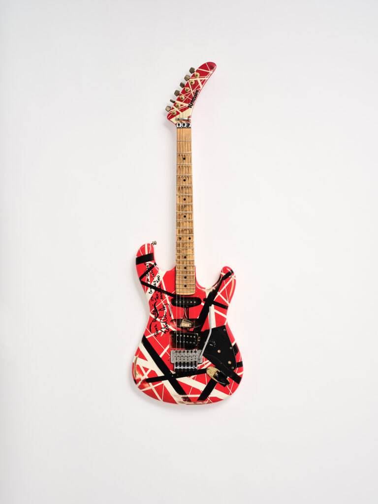 Eddie Van Halen's custom-made Kramer guitar, made in 1982, in artist's own red, black and white finish. 