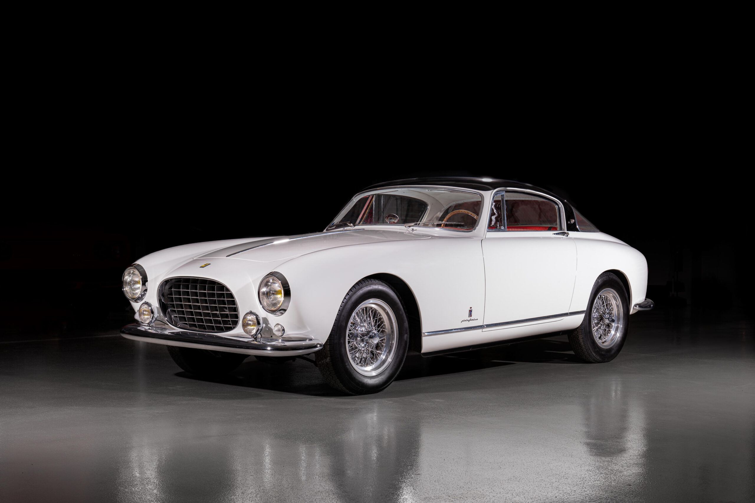 A Ferrari Europa 250 GT 1956 in white with green roof sold at auction for $1.5 million.