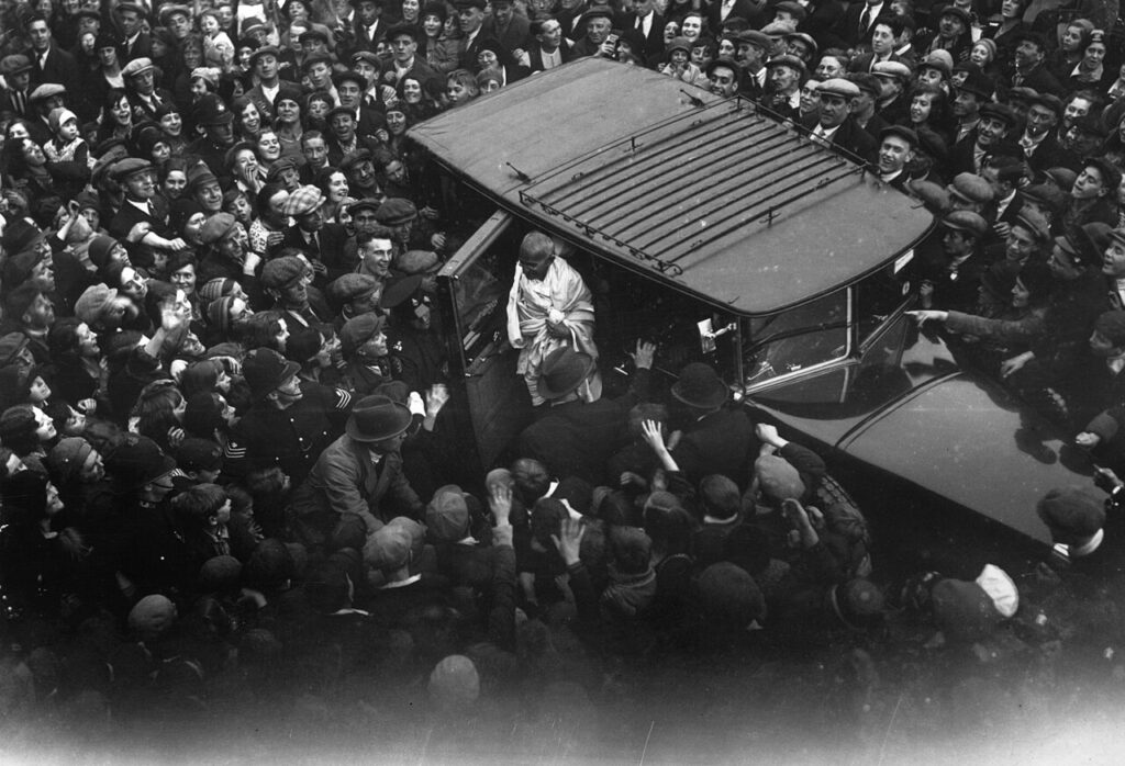 Gandhi with an admiring crowd in the East End of London, 1931. 