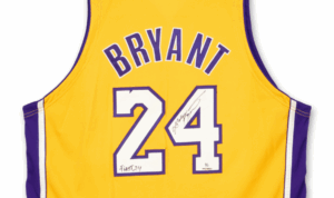 LA Lakers No 24 jersey worn by Kobe Bryant in 2006 and signed by Bryant and inscribed "the first 24"