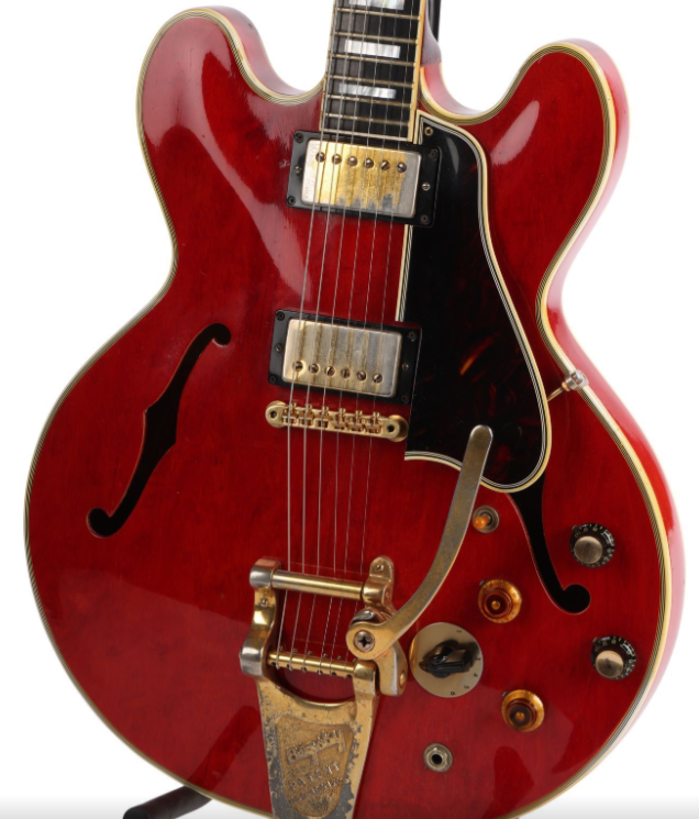 Smashed ES 335 Gibson guitar owned by Noel Galagher of Oasis.