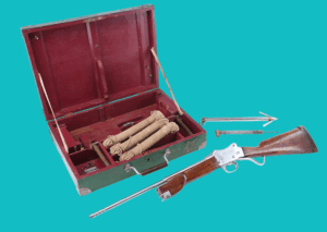 Harpoon gun used by Quint in Jaws with case and ammunition.
