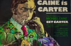 Image courtesy of Bonhams. Get Carter film poster showing Michael Caine as Carter, a murderous London gangster.