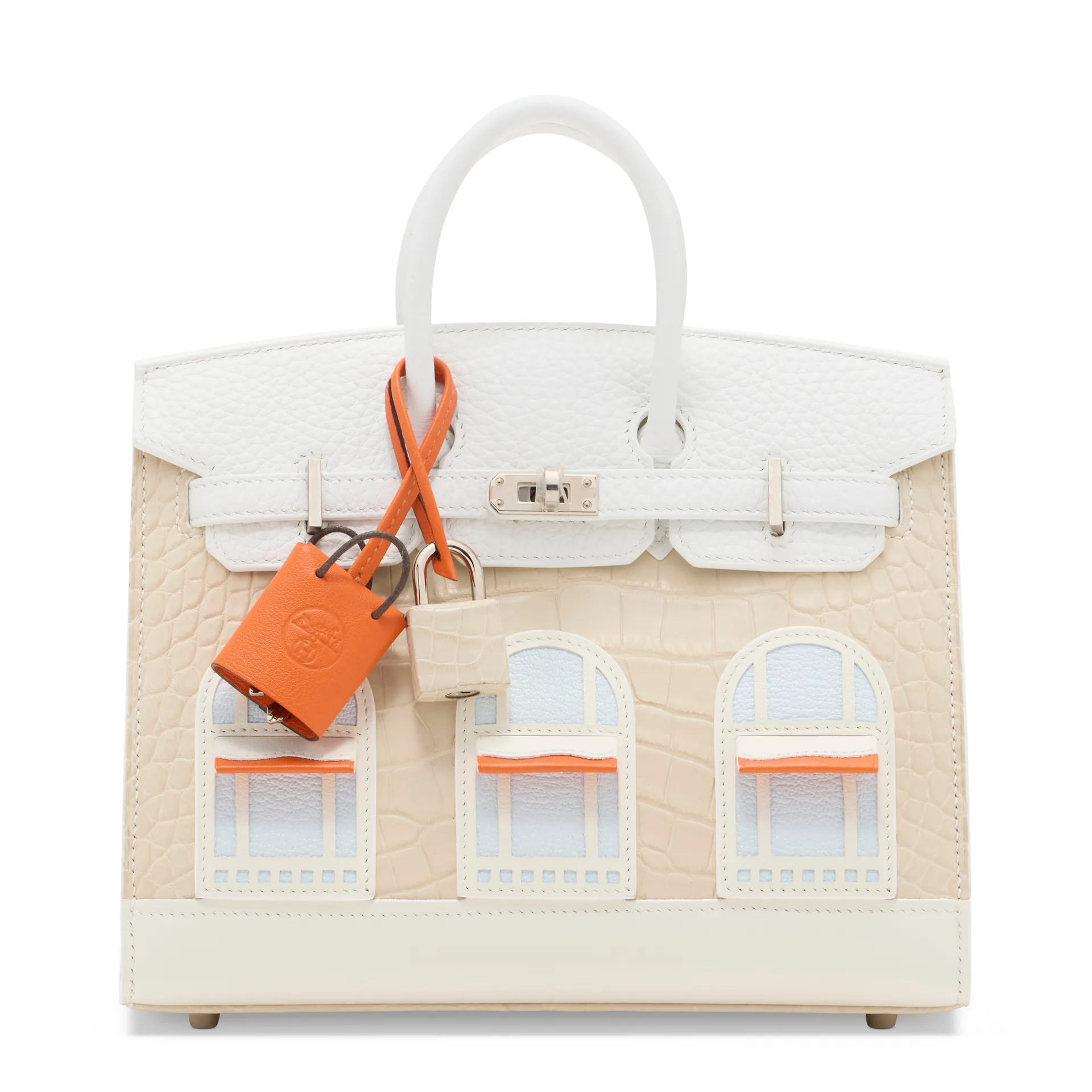 A pink handbag styled to look like the front of a house