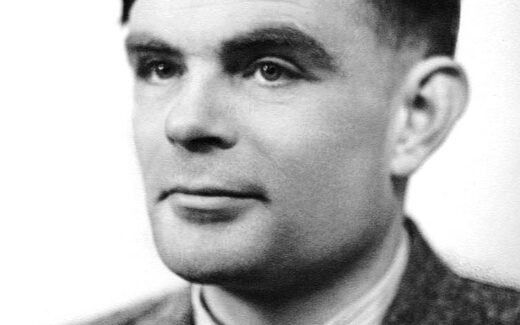 portrait photo of Alan Turing.