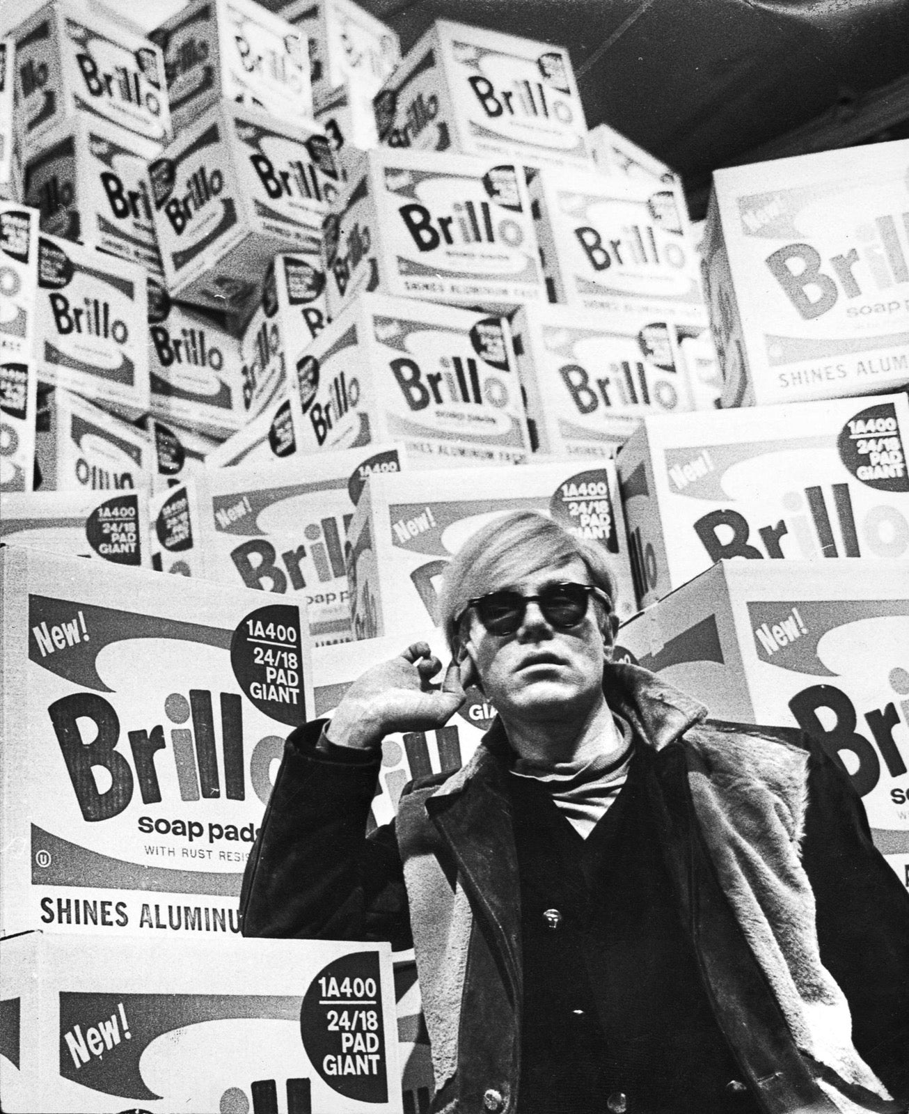 Andy Warhol among his Brillo Box sculptures, Stockholm, 1968