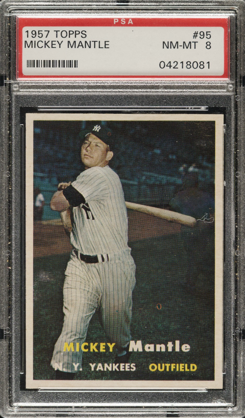 1957 Topps Mickey Mantle card in a PSA NM-MT 8 holder