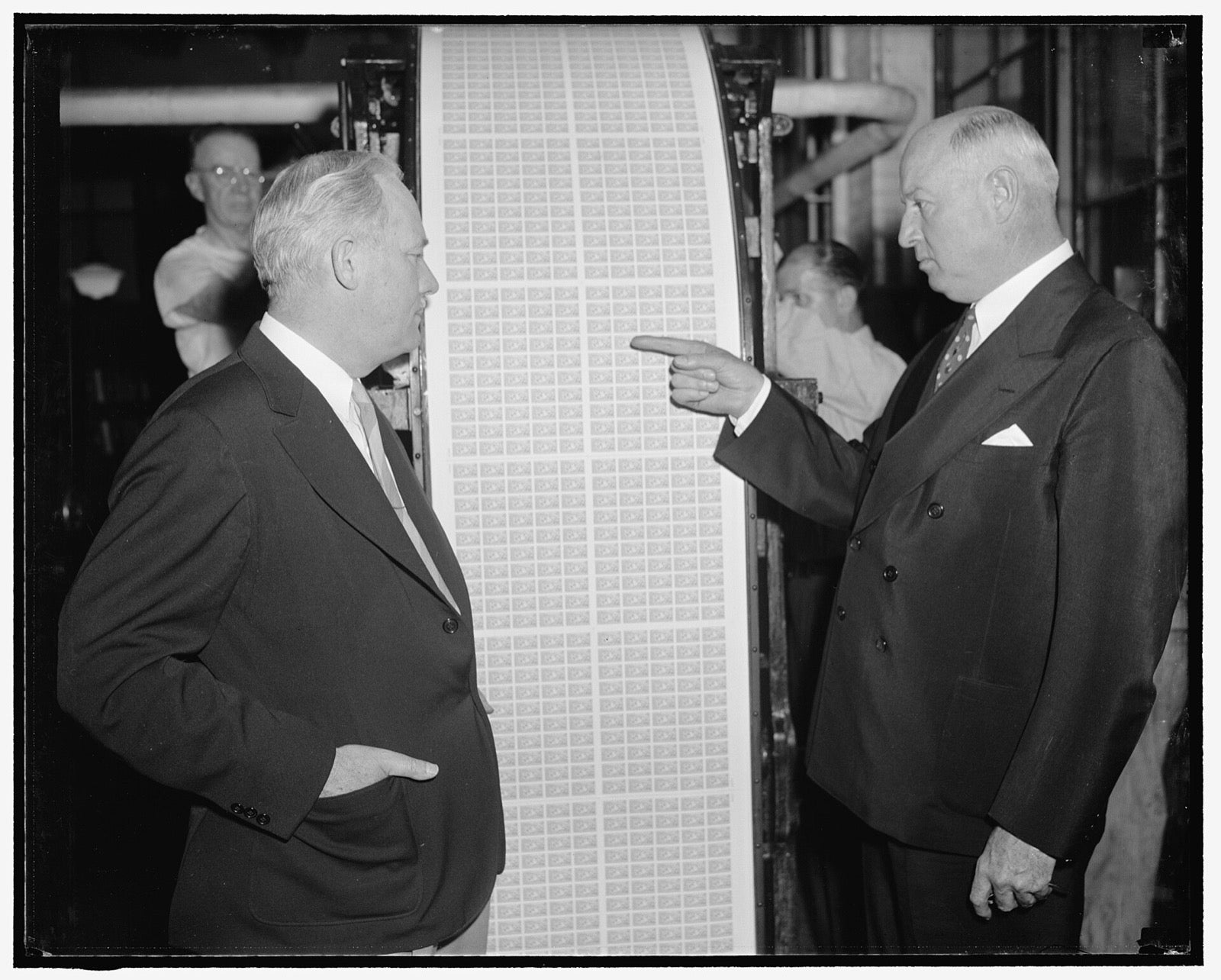 Postmaster General James Farley at a stamp printing press