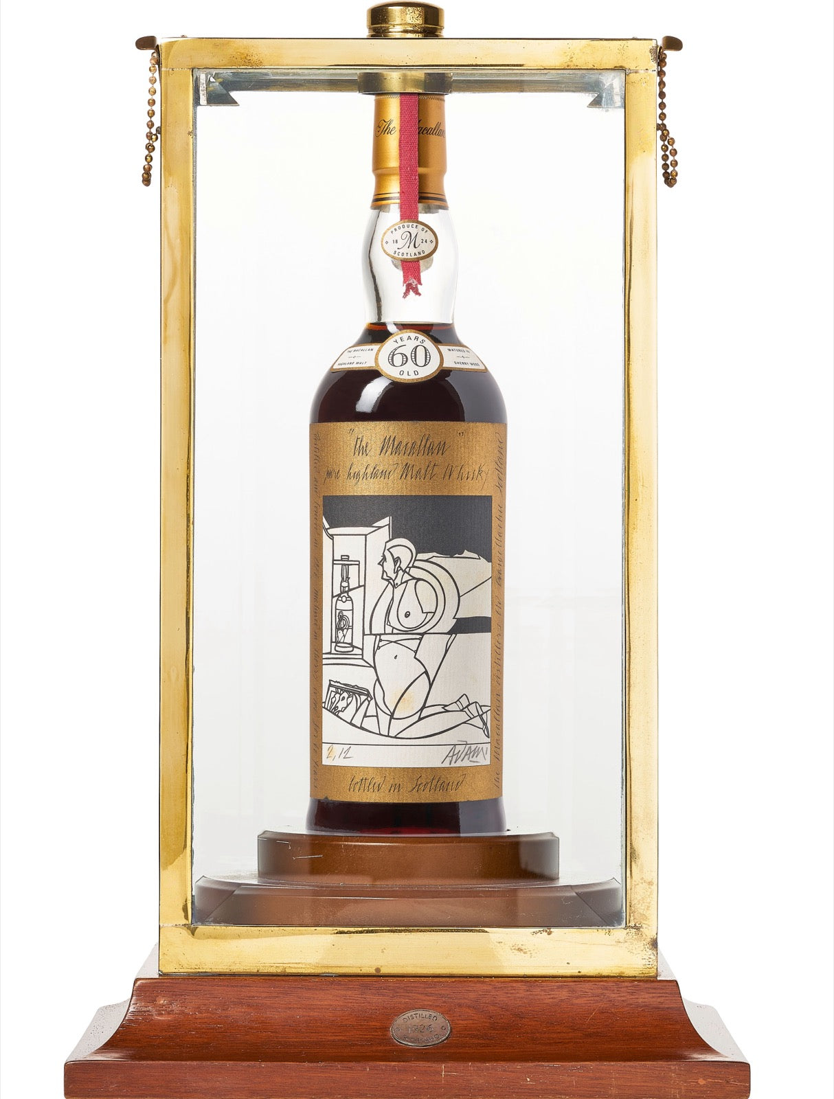 Macallan 1926 Valerio Adami bottle in its display cabinet