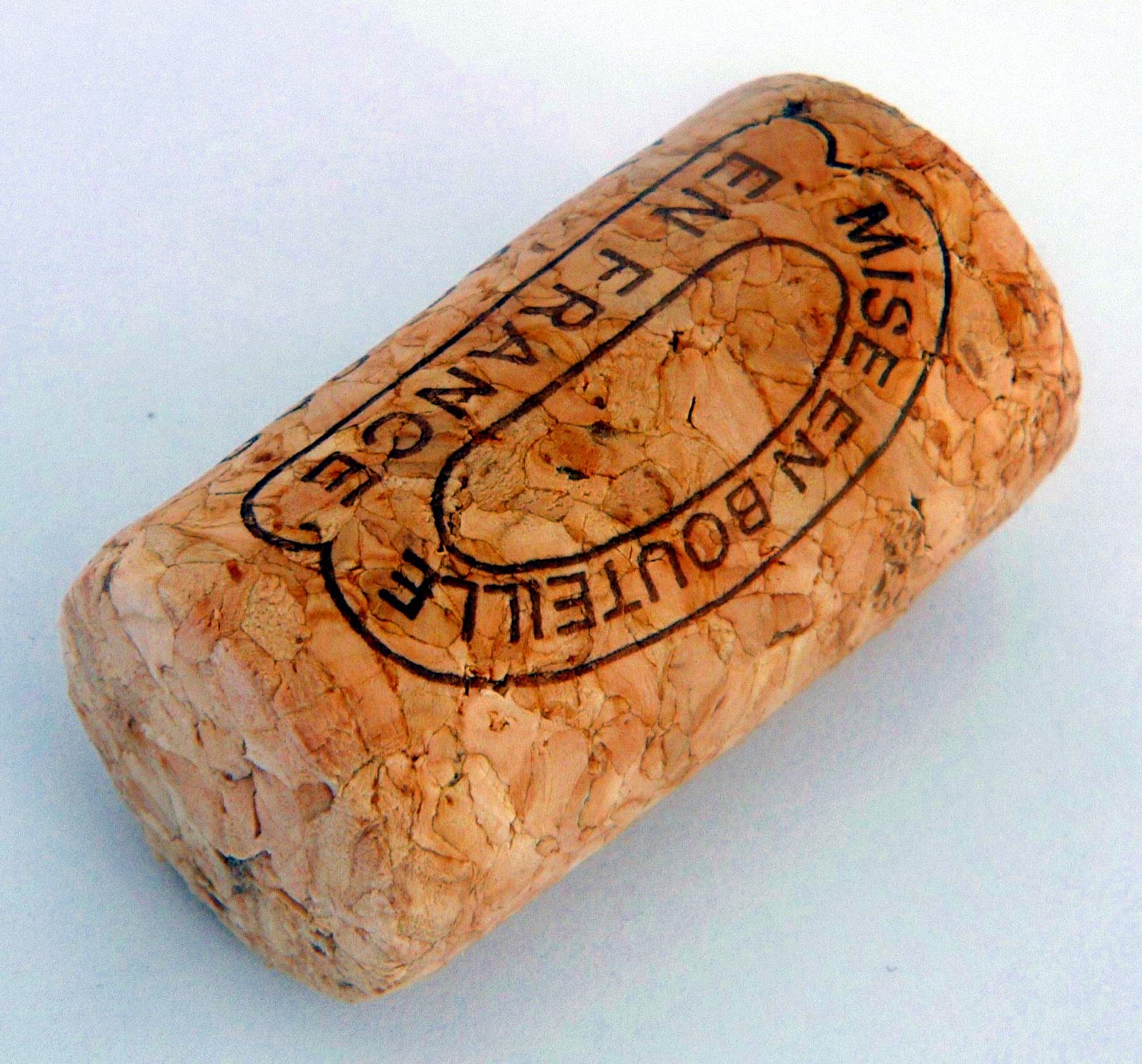 A wine cork stamped with its bottling origin