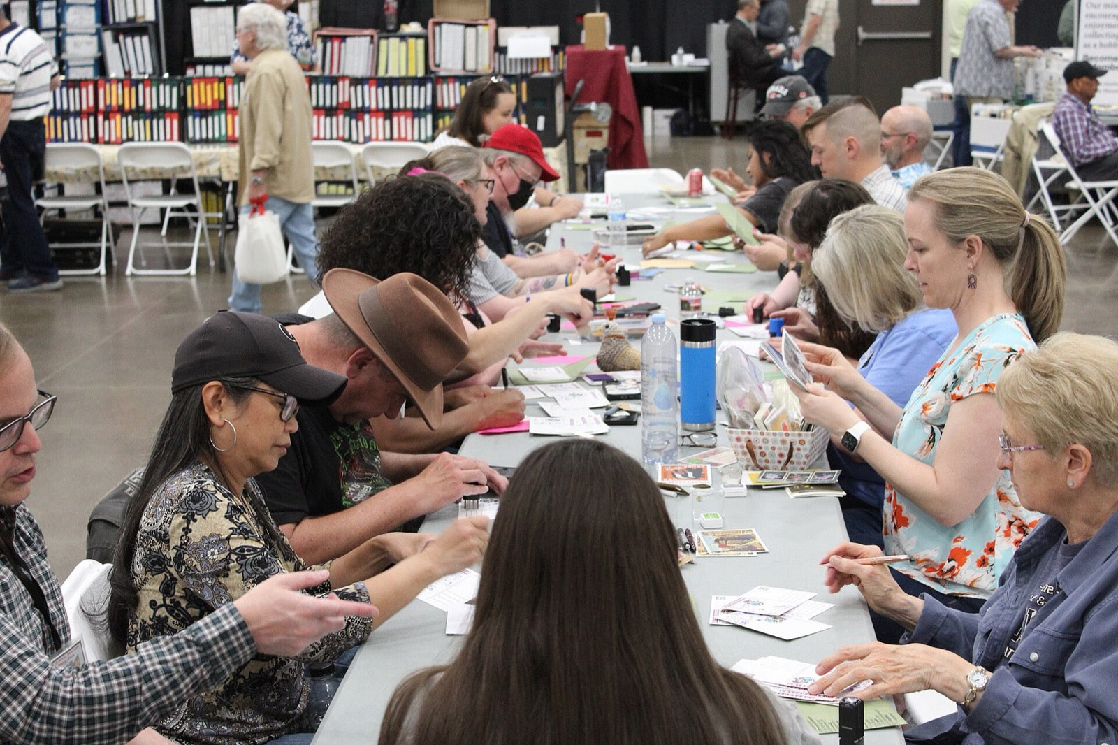 Collectors and dealers meeting at a stamp show