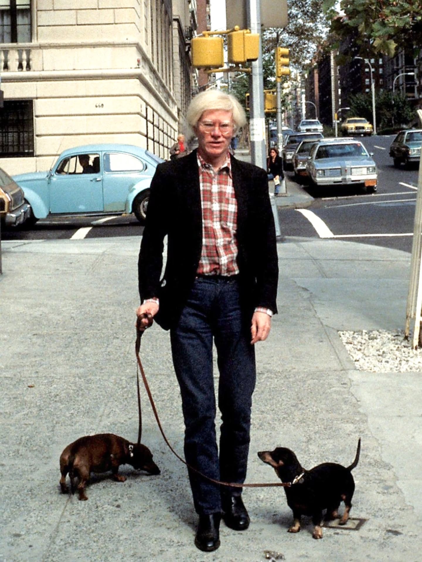 Andy Warhol with his dog, Archie, circa 1972-77, demonstrating the artist's engagement with everyday subject matter