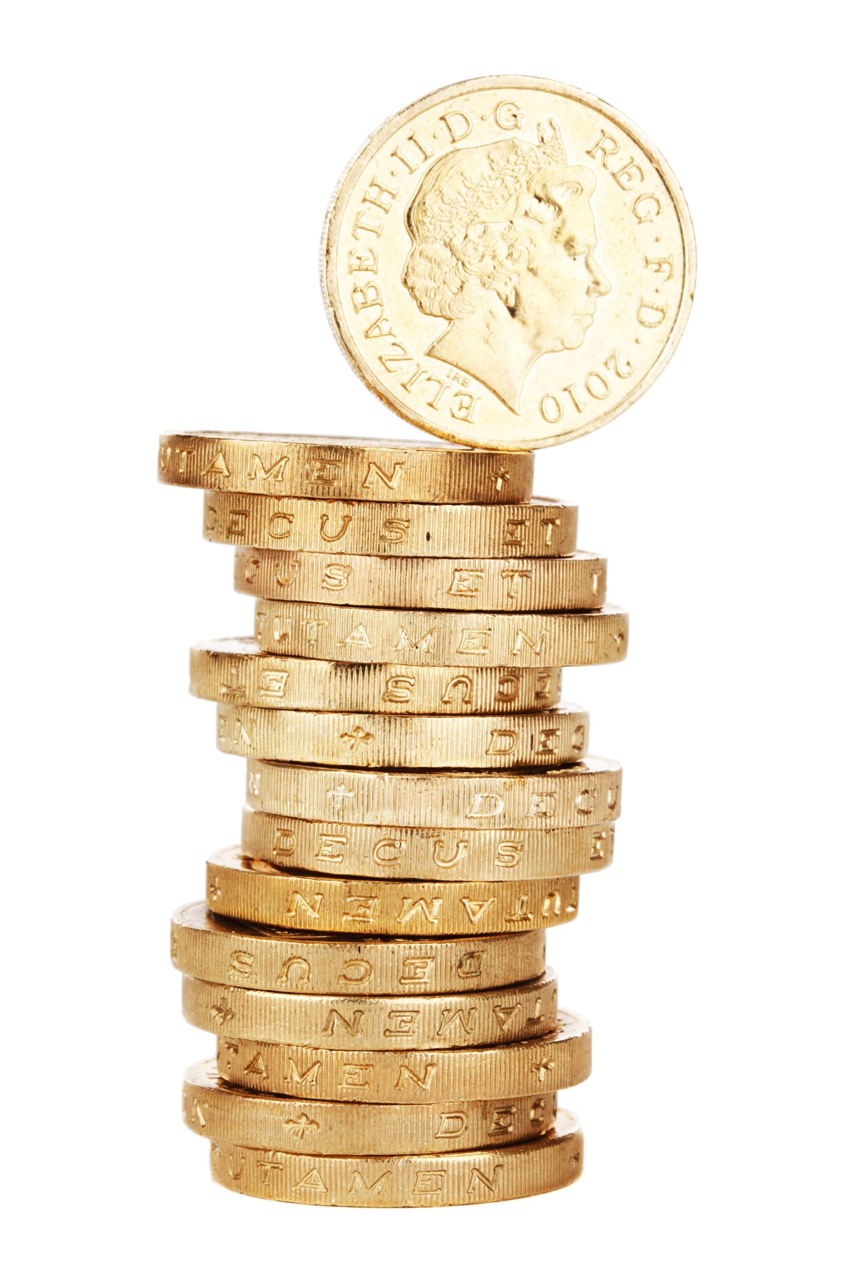 The edges of the stacked coins feature incuse lettering, with visible portions of the inscription reading DECUS ET TUTAMEN separated by small cross symbols.