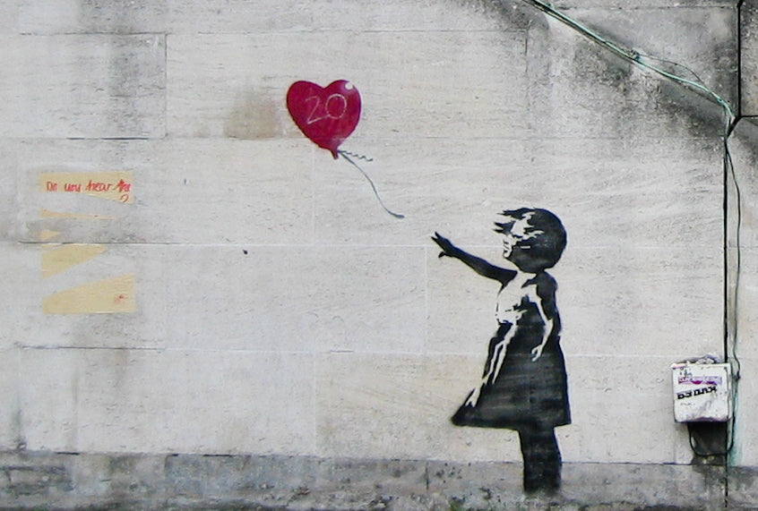 Girl with Balloon (2002), stenciled mural by Banksy formerly on Waterloo Bridge in London; the work was later removed.