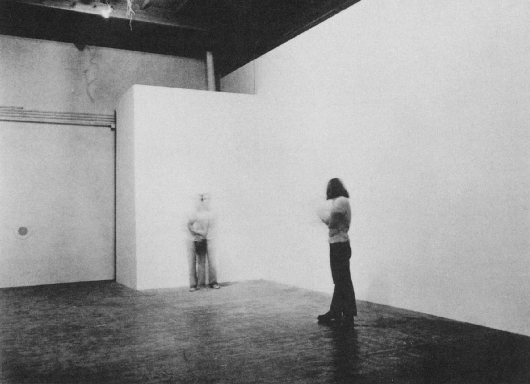 Chris Burden amid performance