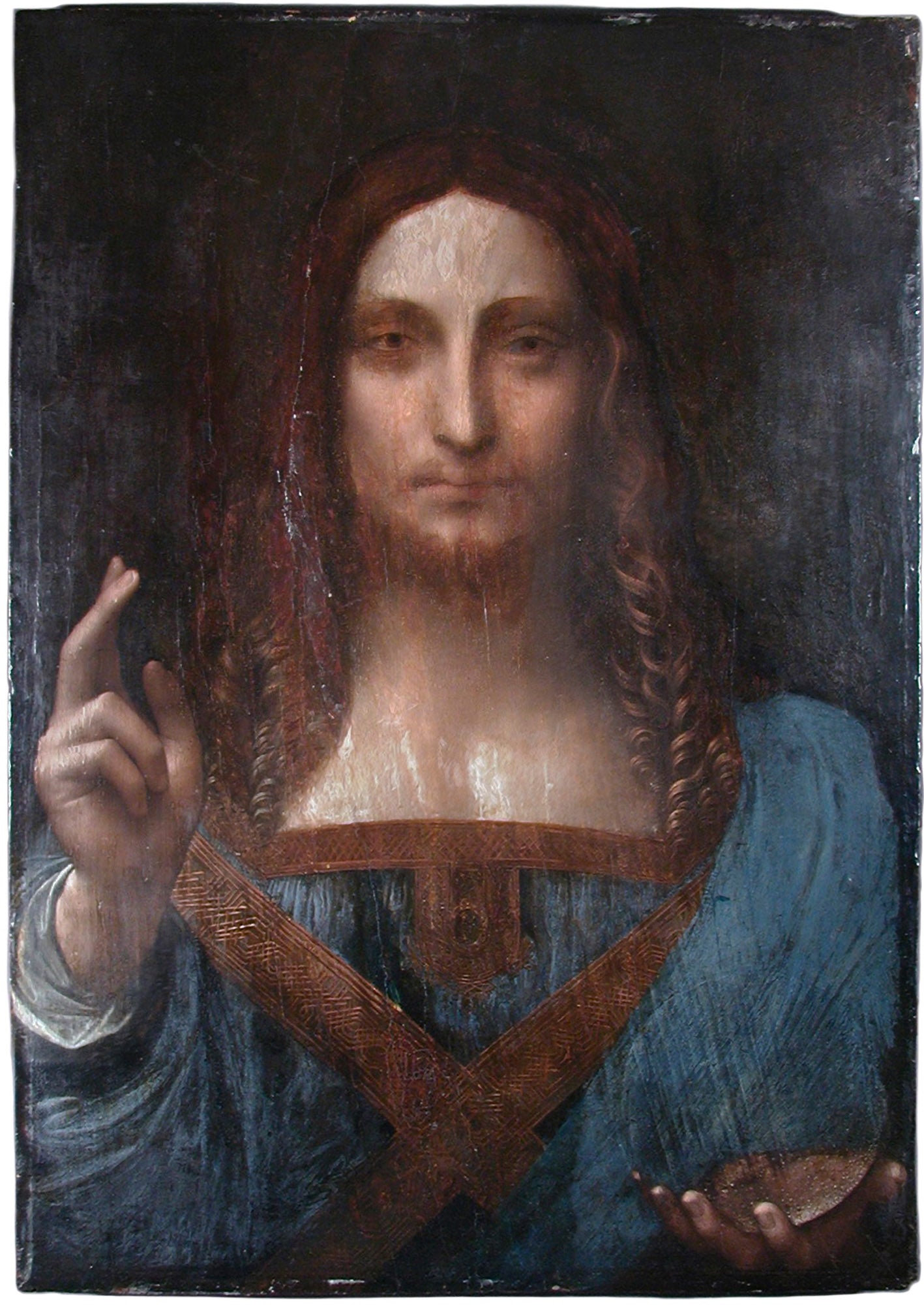 Christ is shown half-length in Renaissance robes, his right hand raised in blessing and his left hand holding a translucent crystal orb representing the world. The soft, blurred shading around the eyes and lips is one of the details specialists point to as evidence of Leonardo's own hand.