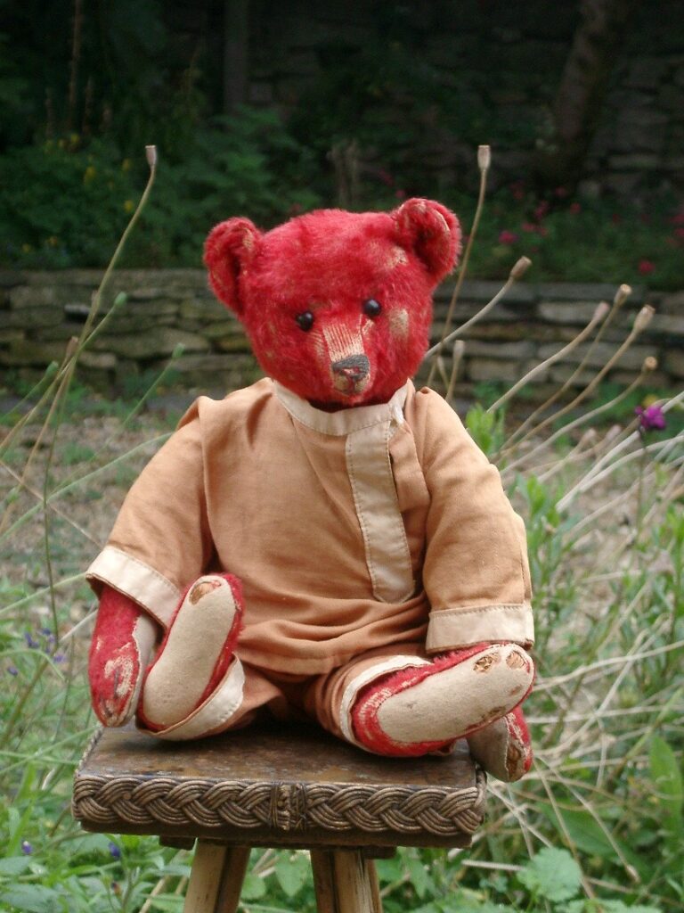 Steiff Alfonzo red mohair teddy bear from 1908 in a Cossack tunic