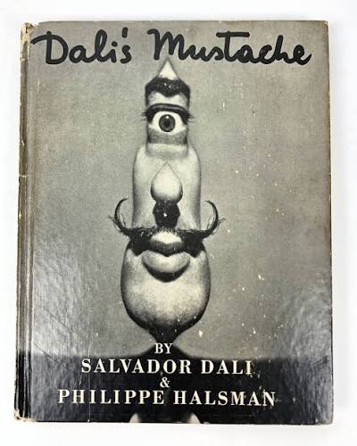 Dali's Mustache first edition with signature on front pastedown