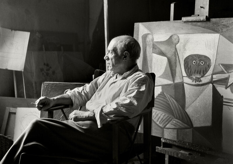Pablo Picasso in his Paris studio surrounded by works in progress
